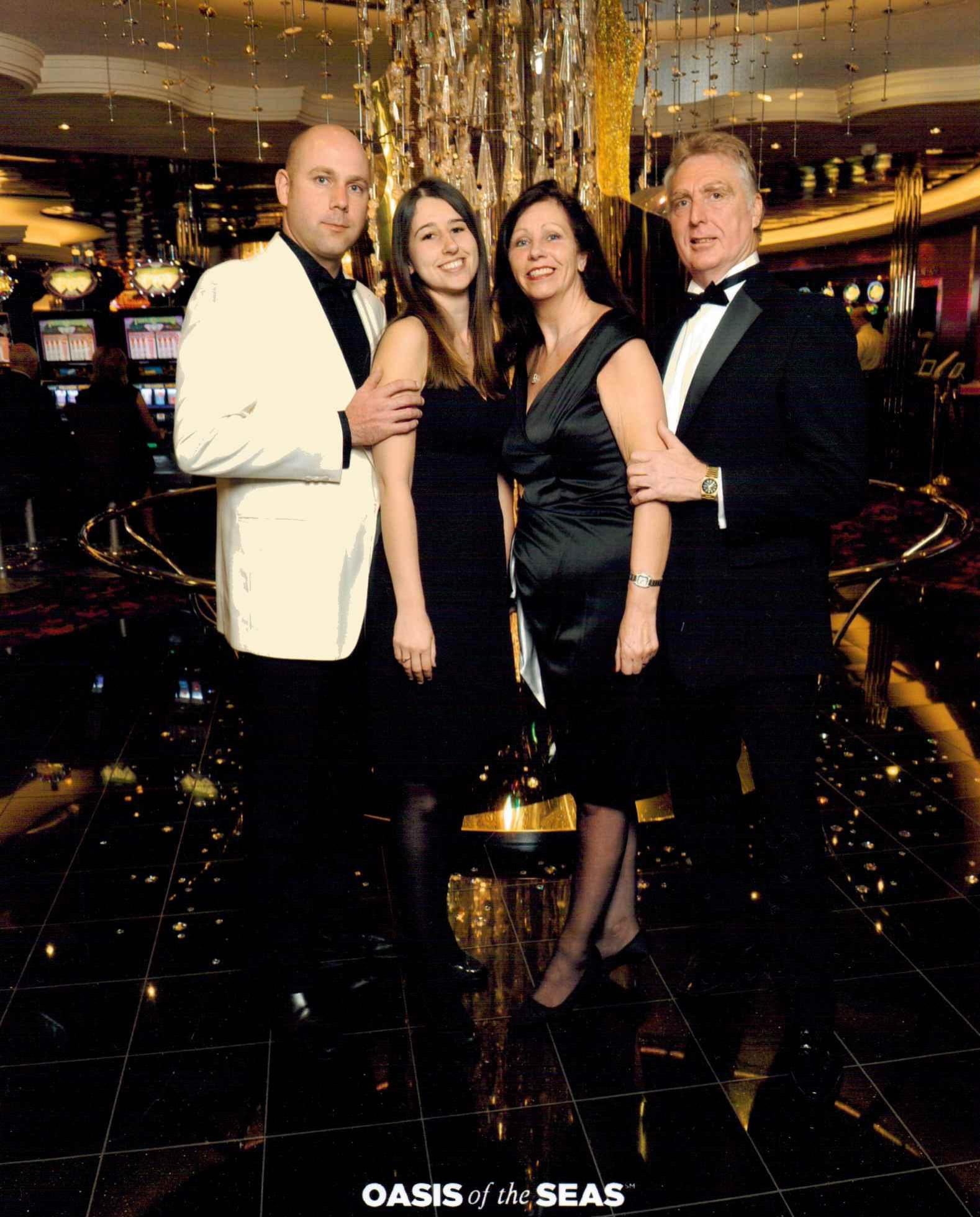 Hannah and her family on a cruise on Oasis of the Seas on formal night