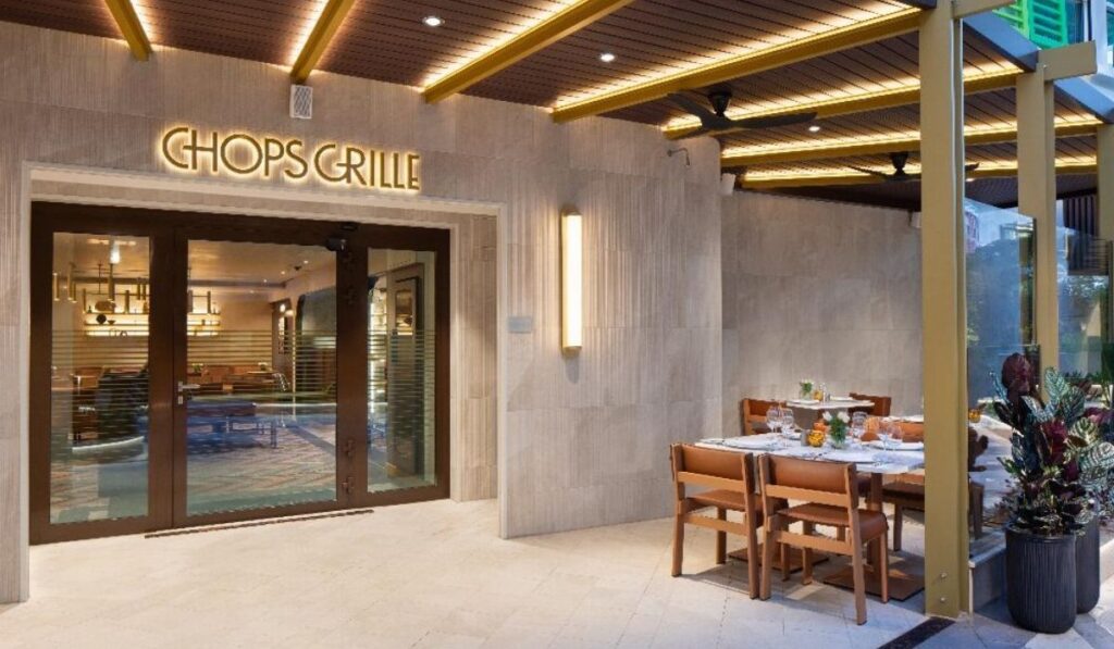 Chops Grille entrance and outdoor seating area on Royal Caribbean' Star of the Seas cruise ship.