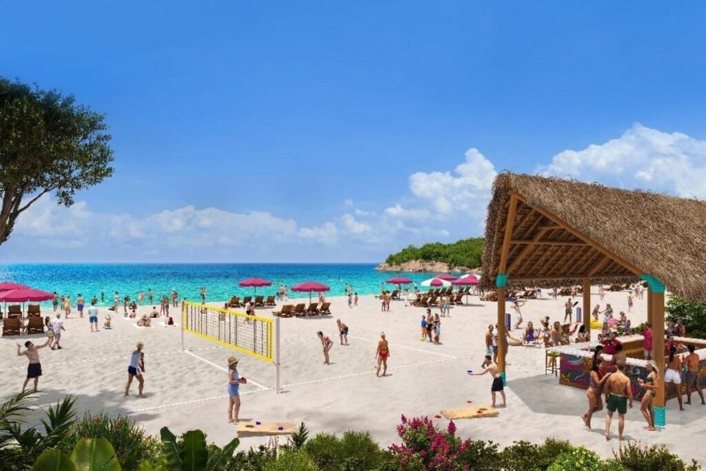 Royal Beach Club Lelepa in Vanuatu with guests relaxing on the beach, playing volleyball and enjoying the waterfront.