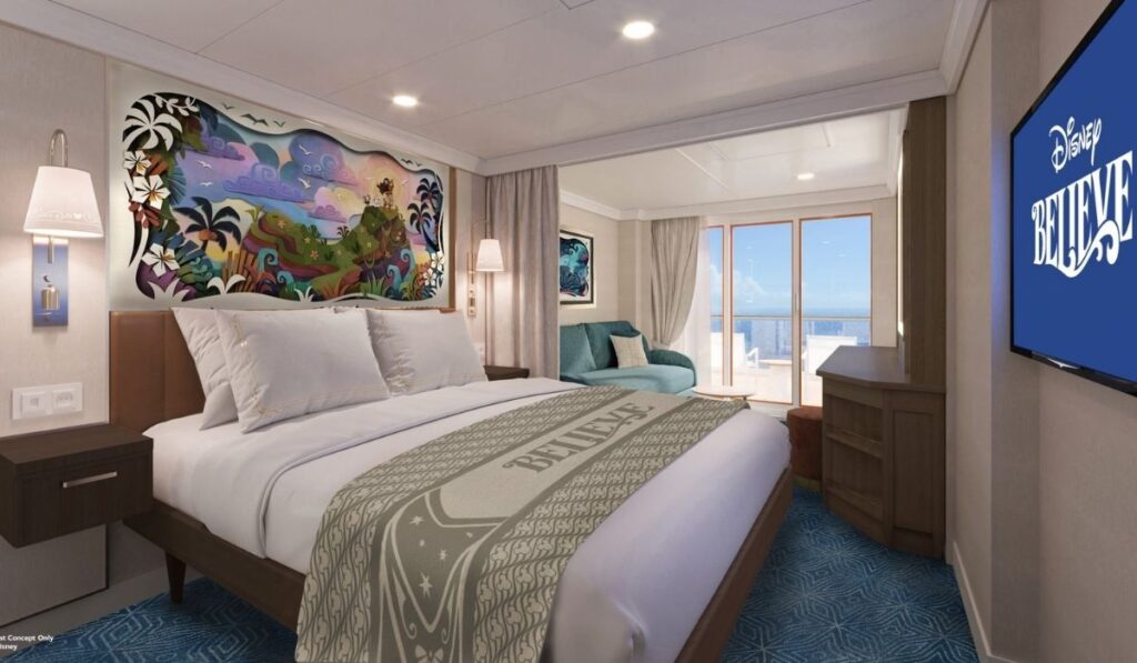 Artist rendering of a Disney Believe verandah stateroom featuring a queen bed, colorful Disney artwork, seating area, and private balcony with ocean views.