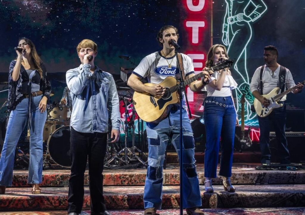 Live band performs on stage during one of Norwegian Luna’s included entertainment shows, Syd Norman's Pour House Presents A Tribute to Eagles.