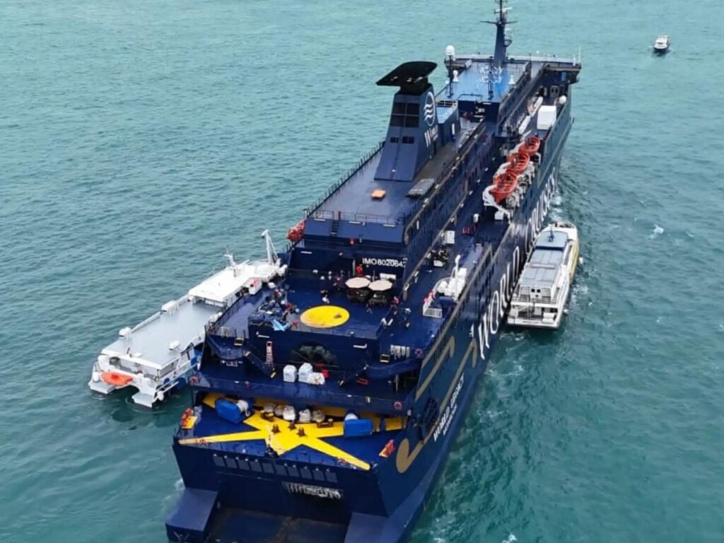 Aerial photo shows World Legacy with response boats positioned alongside during the incident.