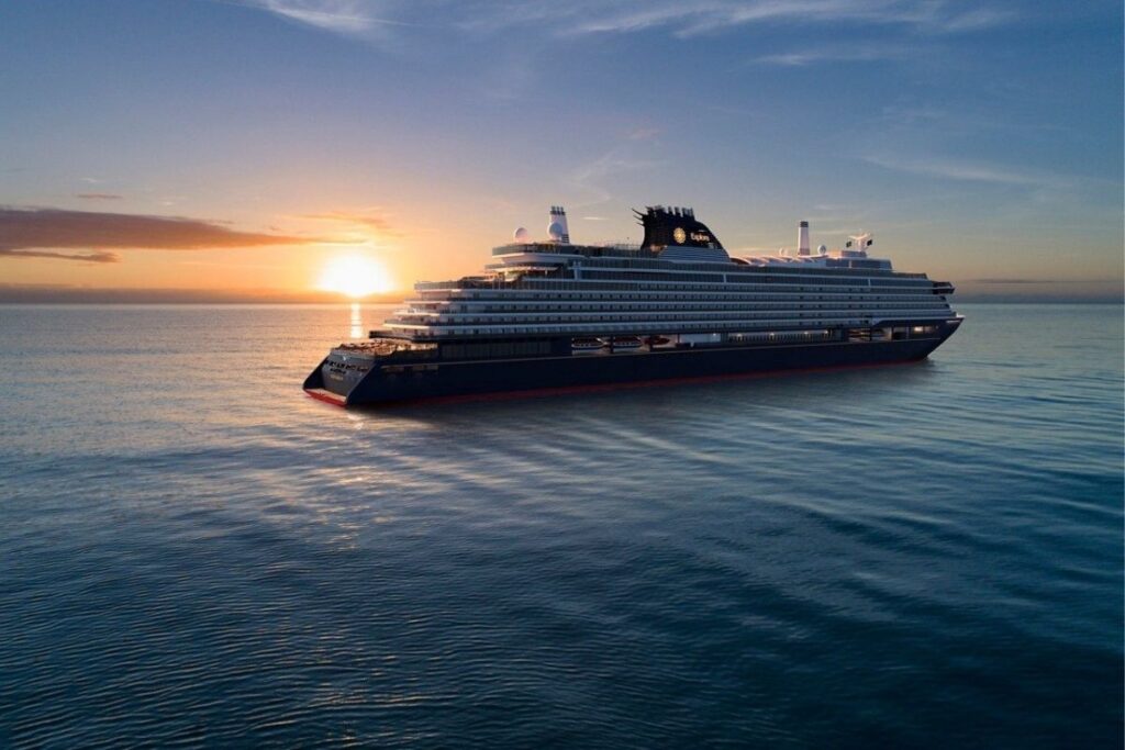 Rendering of Explora Journeys V cruise ship sailing at sunset on calm open water.
