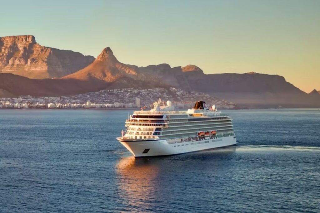 Rendering of Viking Lyra cruise ship rendering showing the sleek white ocean ship sailing at sea.