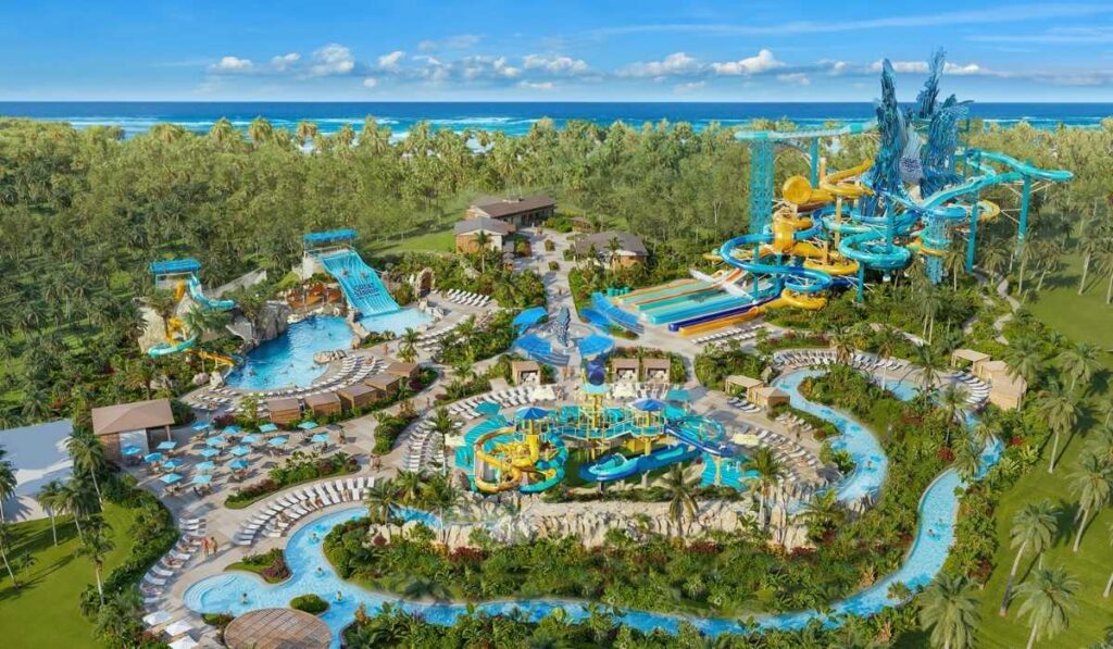 Aerial rendering of Great Tides Waterpark on Great Stirrup Cay with colorful waterslides, pools, and a winding lazy river.