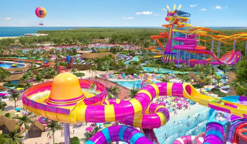 Rendering of Royal Caribbean’s planned Perfect Day Mexico waterpark with bright pink and yellow slides, pools, beach areas, and coastal greenery.