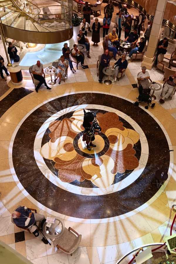 A bagpiper on the Regal Princess 