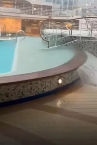 Water pouring over side of crown princess pool in tilt