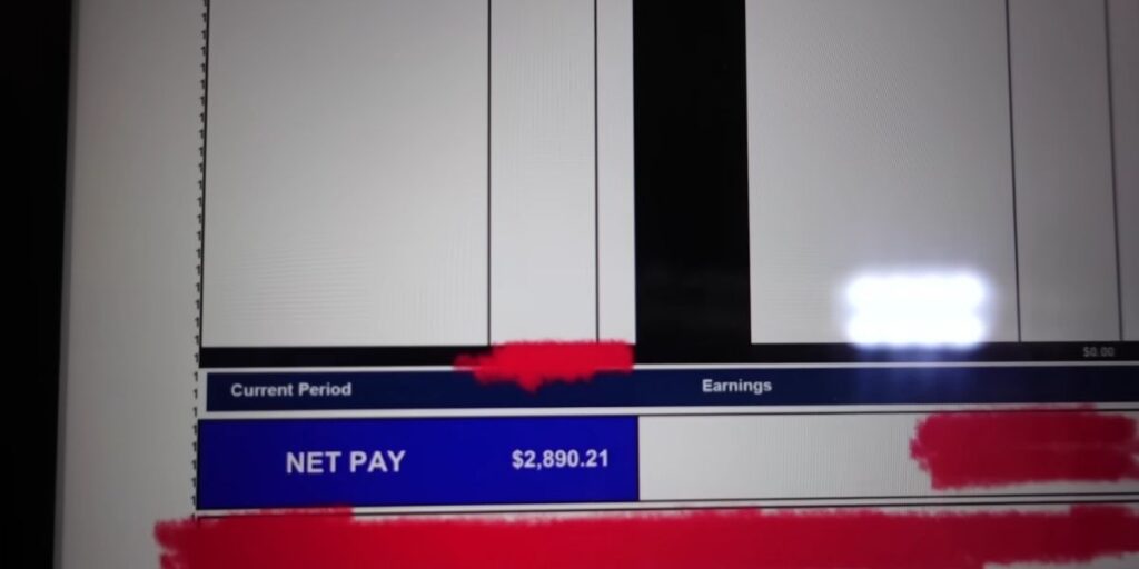 Screenshot of Royal Caribbean casino host Chris Wong’s payslip, showing a net pay of $2,890.21 for the current period, with other sensitive details redacted in red. The image offers a glimpse into cruise ship crew earnings shared by vlogger Chris Wong.