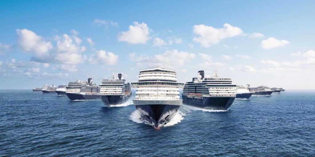An image of six Holland America Ships sailings on the sea, appearing as if they are sailing towards us.