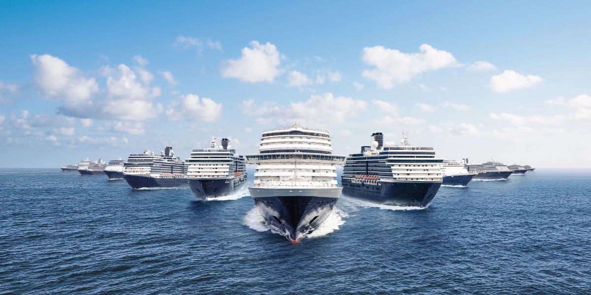 An image of six Holland America Ships sailings on the sea, appearing as if they are sailing towards us.