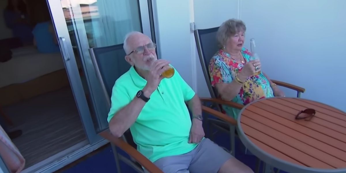 Jess and Marty drinking on the balcony