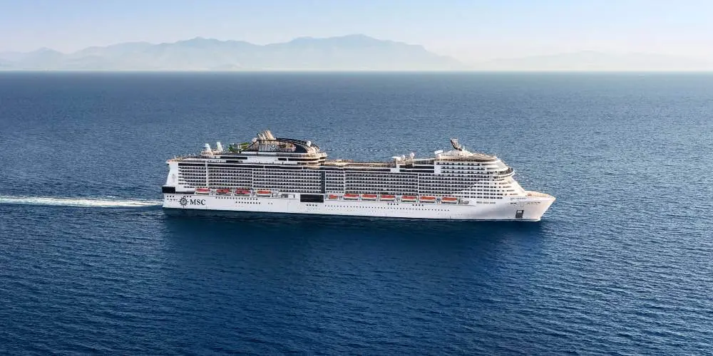 A photo of the MSC Virtuosa sailing on the ocean.