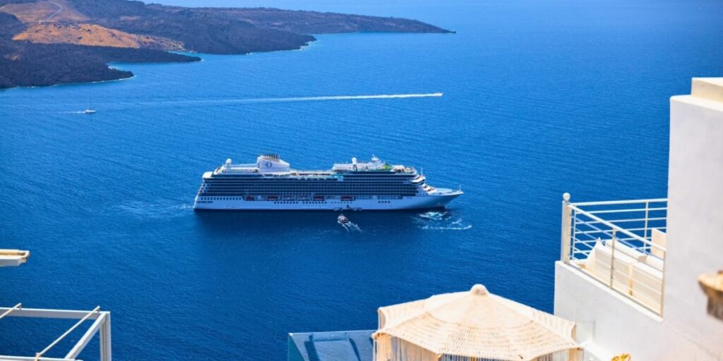 The Oceania Vista Cruise Ship sailing near by Santorini Greece