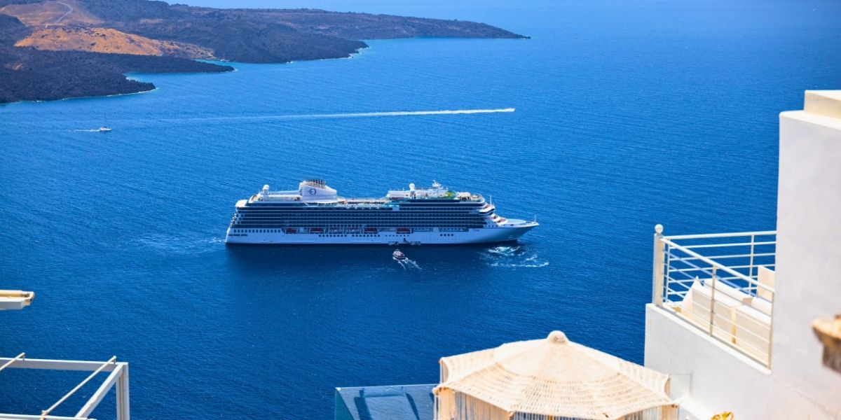 The Oceania Vista Cruise Ship sailing near by Santorini Greece