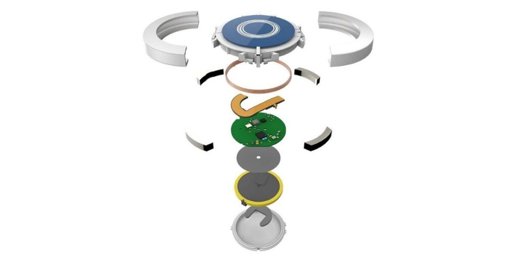 Exploded view of the Princess Cruises Medallion, showing its internal components including the outer shell, antenna coil, circuit board, battery, and other layered elements that enable onboard navigation and personalized cruise experiences.