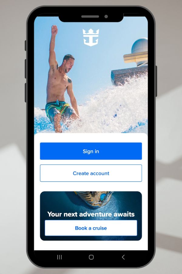 A man joyfully surfing a wave on a flowrider aboard a Royal Caribbean cruise ship, viewed through a smartphone app with options to sign in, create an account, and book a cruise.