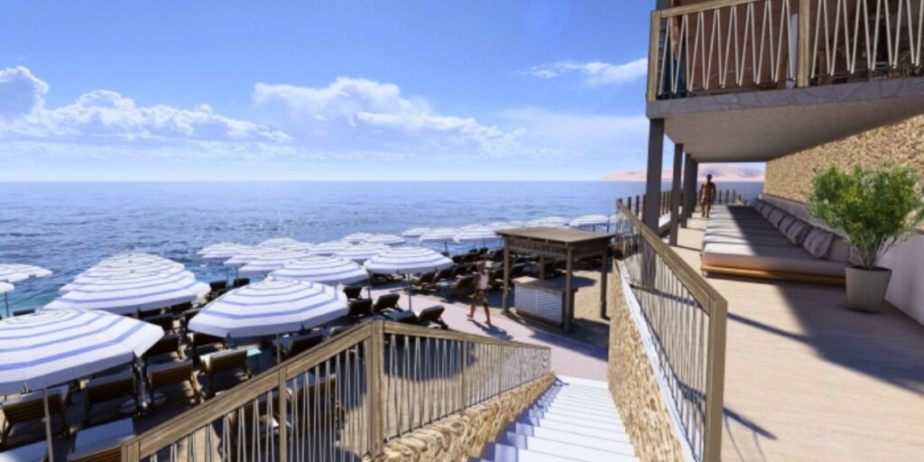 Render of the Royal Beach Club Santorini showing a sun-drenched terrace with cushioned lounge seating overlooking rows of white-and-blue striped umbrellas along the beach. A staircase leads down to the sand, where guests relax beside the calm Aegean Sea under a bright summer sky.