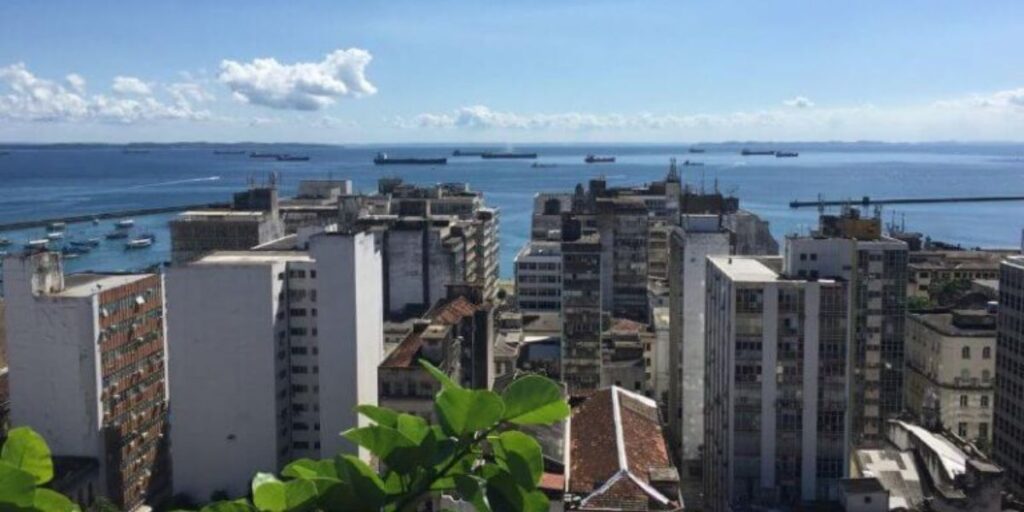 High buildings near Salvador De Bahia, Brazil with a  slight view of other ships cruising near the port