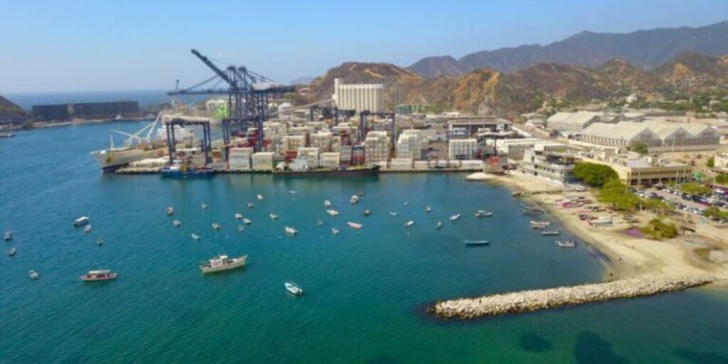 An aerial shot of Santa Marta, Colombia with small boats scattered around the sea