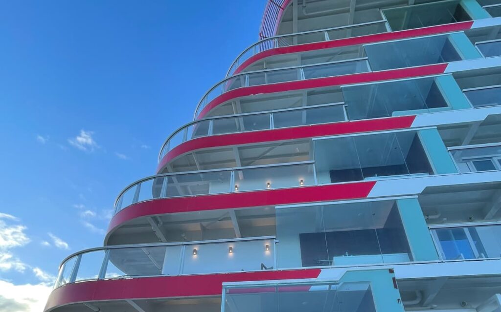 Never climb or sit on cruise balcony railings.