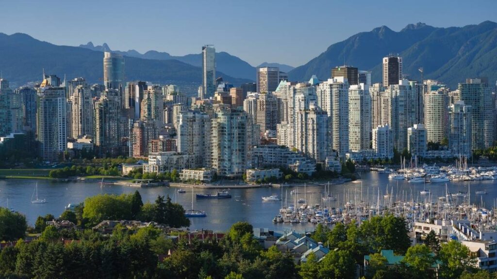 A photo of Vancouver, Canada. Looking over the city and water.