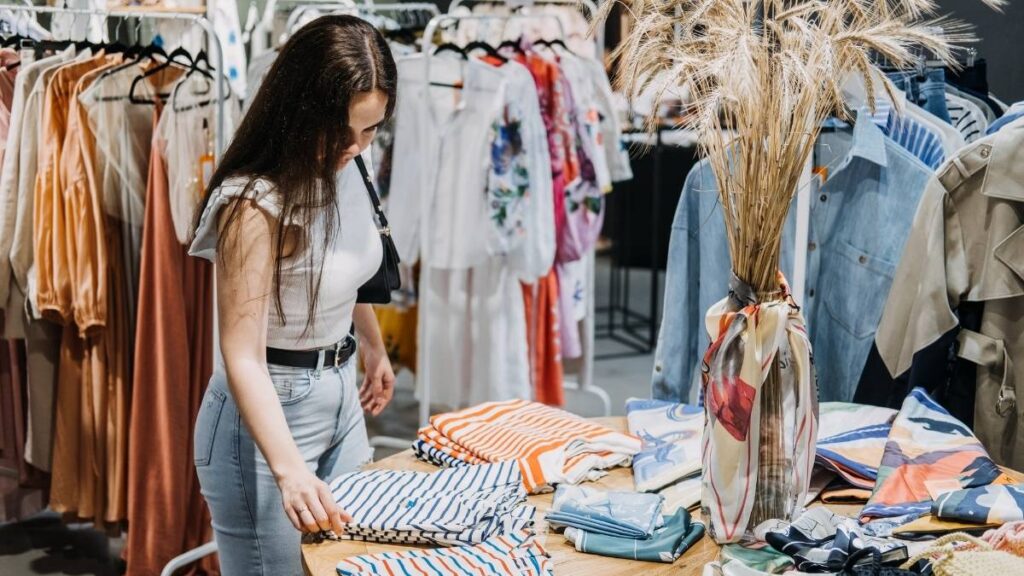 A woman shopping for clothes in a cruise port