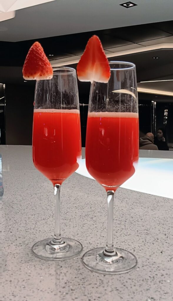 Yummy strawberry champagned served on a  white marble table. 