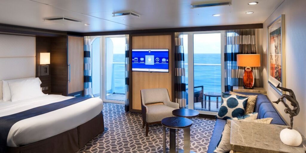 An interior view of a junior suite, looking spacious with its balcony